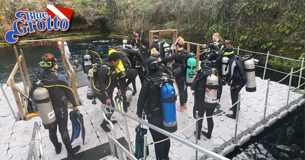 Divers on dock